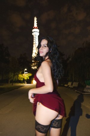 Sensual Sally Hunter in red dress smoking at night, no underwear showing through fabric, outdoor tease — Sally Hunter #6