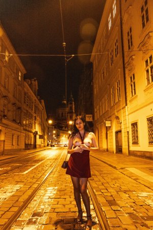 Sensual Sally Hunter in red dress smoking at night, no underwear showing through fabric, outdoor tease — Sally Hunter #15