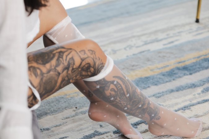 Tormenta teases from her couch in sheer stockings and shorts — Tormenta #7