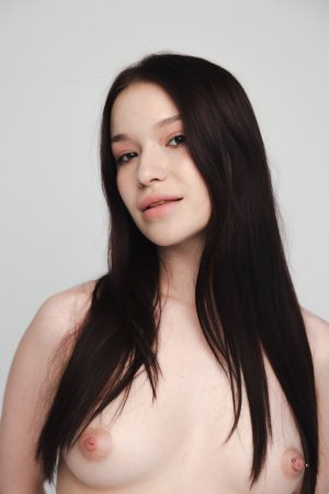 Wikki Kee starts poised then drops all restraint in studio closeups showing her pierced nipples — Wikki Kee #1
