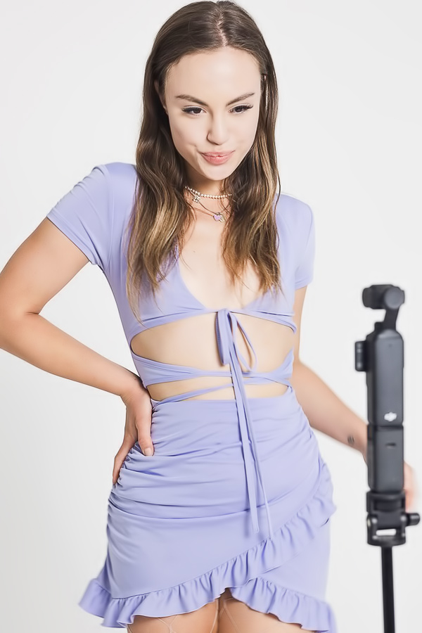 Mash Cherry teases in purple cutout dress and fishnets, fingers her wet pussy solo in studio