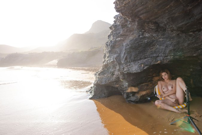 Sally Hunter bares skin in black lace on sunlit sand, posing with wet hair and sandy thighs — Sally Hunter #23