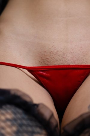 Lilith Baph teases in red lingerie and fishnets then fingers her soaked pussy on bed — Lilith Baph #5