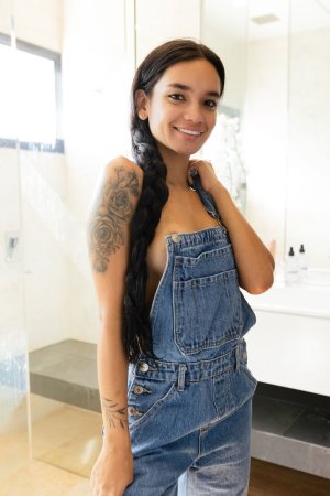 Dulce sits floor by window painting then strips to masturbate with dildo in denim overalls — Dulce #1