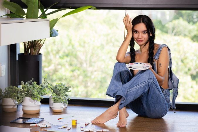 Dulce sits floor by window painting then strips to masturbate with dildo in denim overalls — Dulce #4