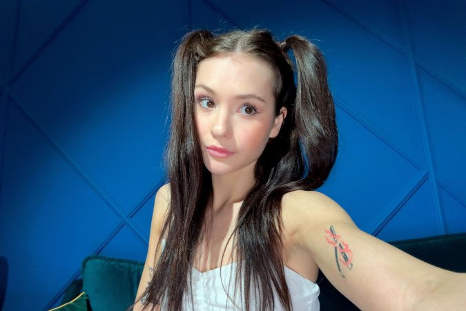 Matty Mila teases in white lace on green couch with pigtails and tattoos for your eyes only — Matty Mila #1