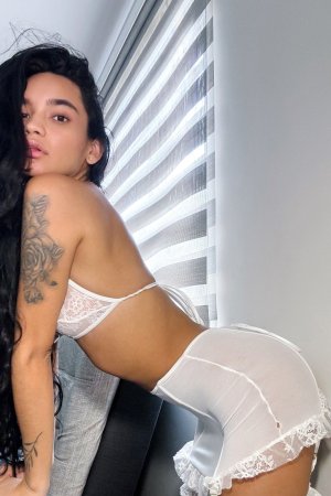 Dulce teases in white lace lingerie at her desk with pen and laptop giving a solo office fantasy — Dulce #24