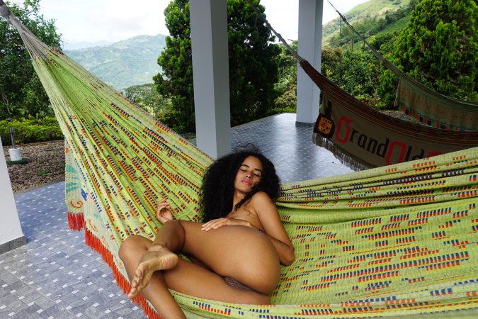 Mia Nix sprawled in a hammock, fingers sliding through her wet slit, mountains watching her moans — Mia Nix #3