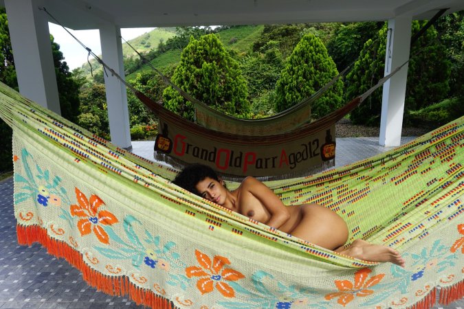 Mia Nix sprawled in a hammock, fingers sliding through her wet slit, mountains watching her moans — Mia Nix #15