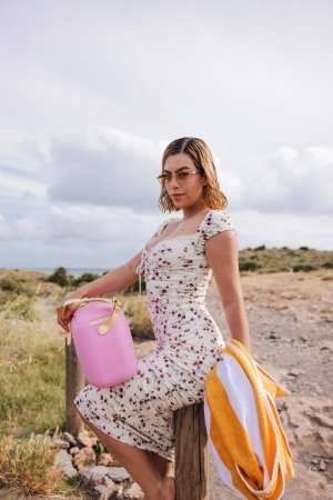 Sally Hunter in floral dress poses barefoot outdoors, teasing with her wet juicy pussy on display — Sally Hunter #5