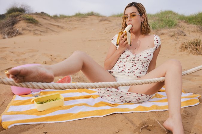 Sally Hunter in floral dress poses barefoot outdoors, teasing with her wet juicy pussy on display — Sally Hunter #7