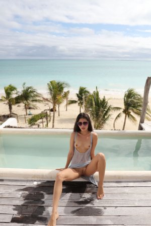 Irene Rouse in sheer dress by poolside ocean, wet hair clinging as she teases with legs spread — Irene Rouse #3