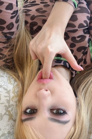 Erika Heiss teases in leopard print and black skirt, posing solo with thigh highs in bedroom mirror — Erika Heiss #17