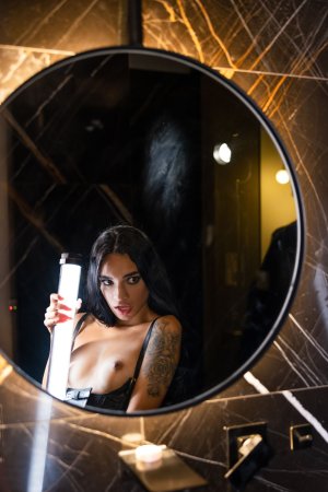 Dulce poses topless in black bathroom holding whip thigh high in lace lingerie and heels — Dulce #16