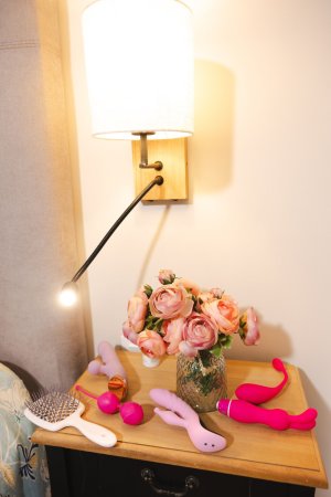 Erika Heiss in pink lace poses on a chair by the mirror flashing her curves and feet in bedroom — Erika Heiss #24