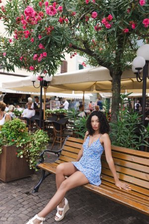 Valery Ponce bends over a gate by Lago Di Garda, flashing her bare ass in a tiny blue dress, teasing passersby — Valery Ponce #20