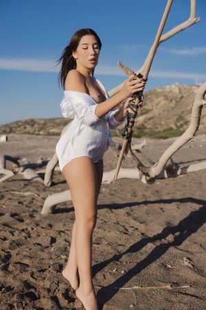 Layla Scarlett soaked in ocean waves, white shirt clinging to her curves as she stands barefoot on the shore — Layla Scarlett #22