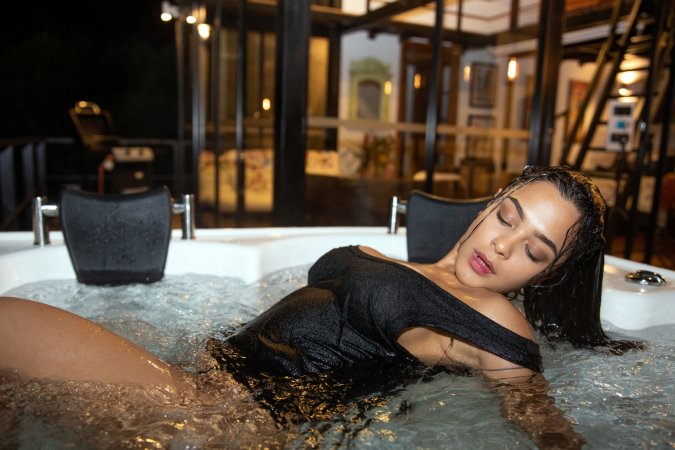 Kaley Jones soaks in bubbling jacuzzi water, wet black lingerie clinging as she teases her curves — Kaley Jones #2