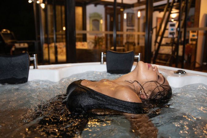 Kaley Jones soaks in bubbling jacuzzi water, wet black lingerie clinging as she teases her curves — Kaley Jones #3