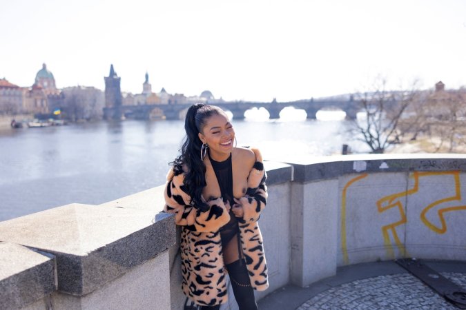 Sofi Vega teasing in sheer black lingerie and fur coat against Pragues river view, craving all eyes on her — Sofi Vega #5