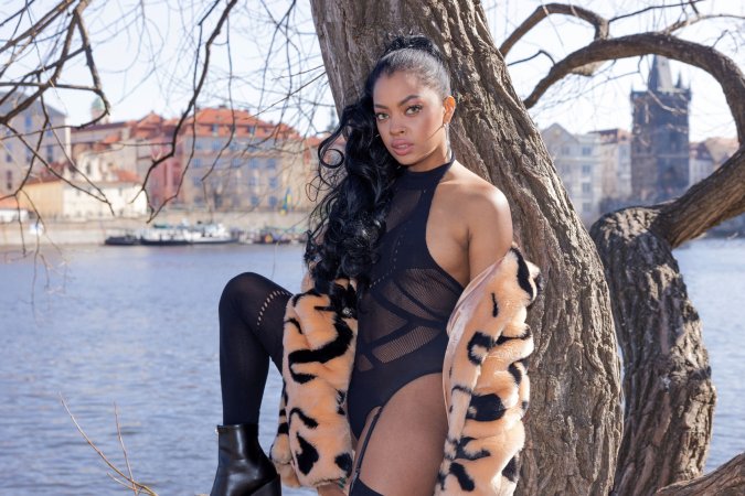 Sofi Vega teasing in sheer black lingerie and fur coat against Pragues river view, craving all eyes on her — Sofi Vega #20