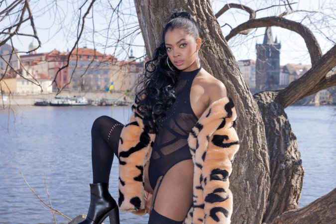 Sofi Vega teasing in sheer black lingerie and fur coat against Pragues river view, craving all eyes on her — Sofi Vega #21