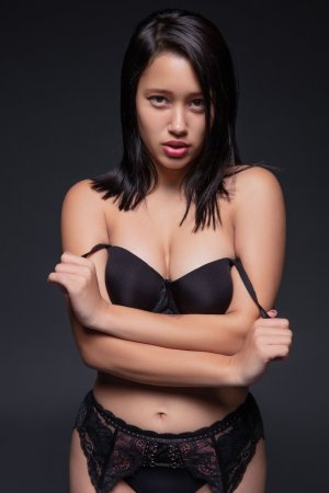 Lia Ponce in black lace, smiling slow then teasing her slit with glass toy in studio — Lia Ponce #2
