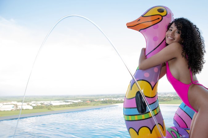 Valery Ponce teases in pink bikini on inflatable, tongue out by the poolside, solo and playful — Valery Ponce #3