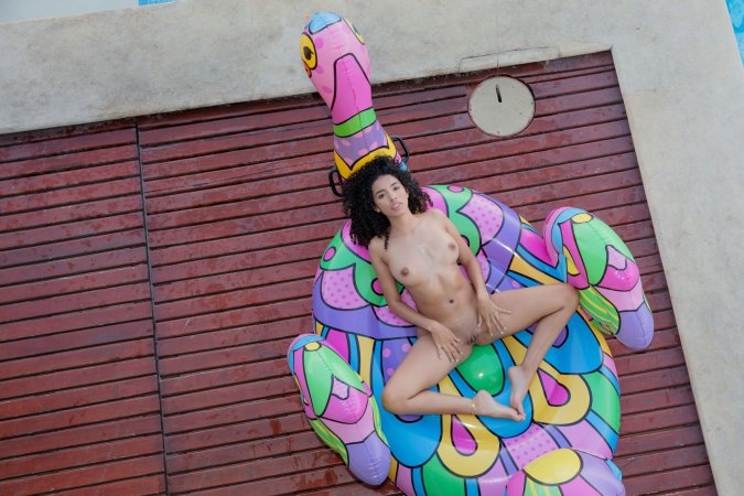 Valery Ponce teases in pink bikini on inflatable, tongue out by the poolside, solo and playful — Valery Ponce #9