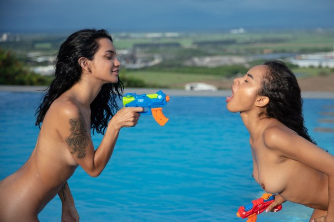 Liloo and Dulce tease in soaked bikinis by the pool, water guns dripping down their curves — Liloo & Dulce #15
