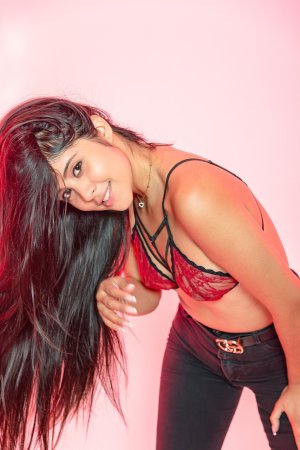 Katie Arias teases in red lace and black jeans, her Latino curves poised for more, hinting at whats coming — Katie Arias #4