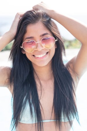 Karin Torres smiles in her bikini by the pool, playful and confident, showing off her toned body — Karin Torres #4