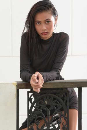 Hiromi teases in a sheer black dress, legs apart against white walls, heels clicking on tile floors — Hiromi #2