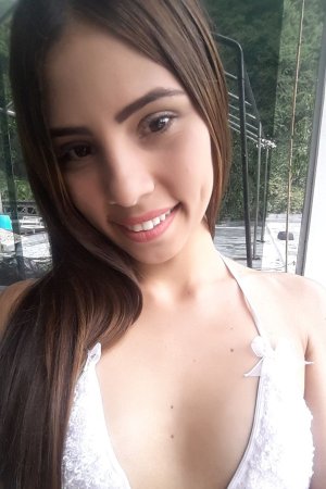 Mily Mendoza teases in white lingerie and robe with playful poses by the window indoors — Mily Mendoza #5