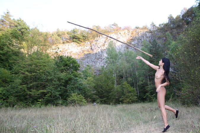 Lady Dee commands the rocks barefoot, topless in camo shorts, teasing with a wild outdoor vibe — Lady Dee #14