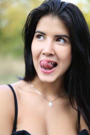 Lady Dee commands the rocks barefoot, topless in camo shorts, teasing with a wild outdoor vibe — Lady Dee #18